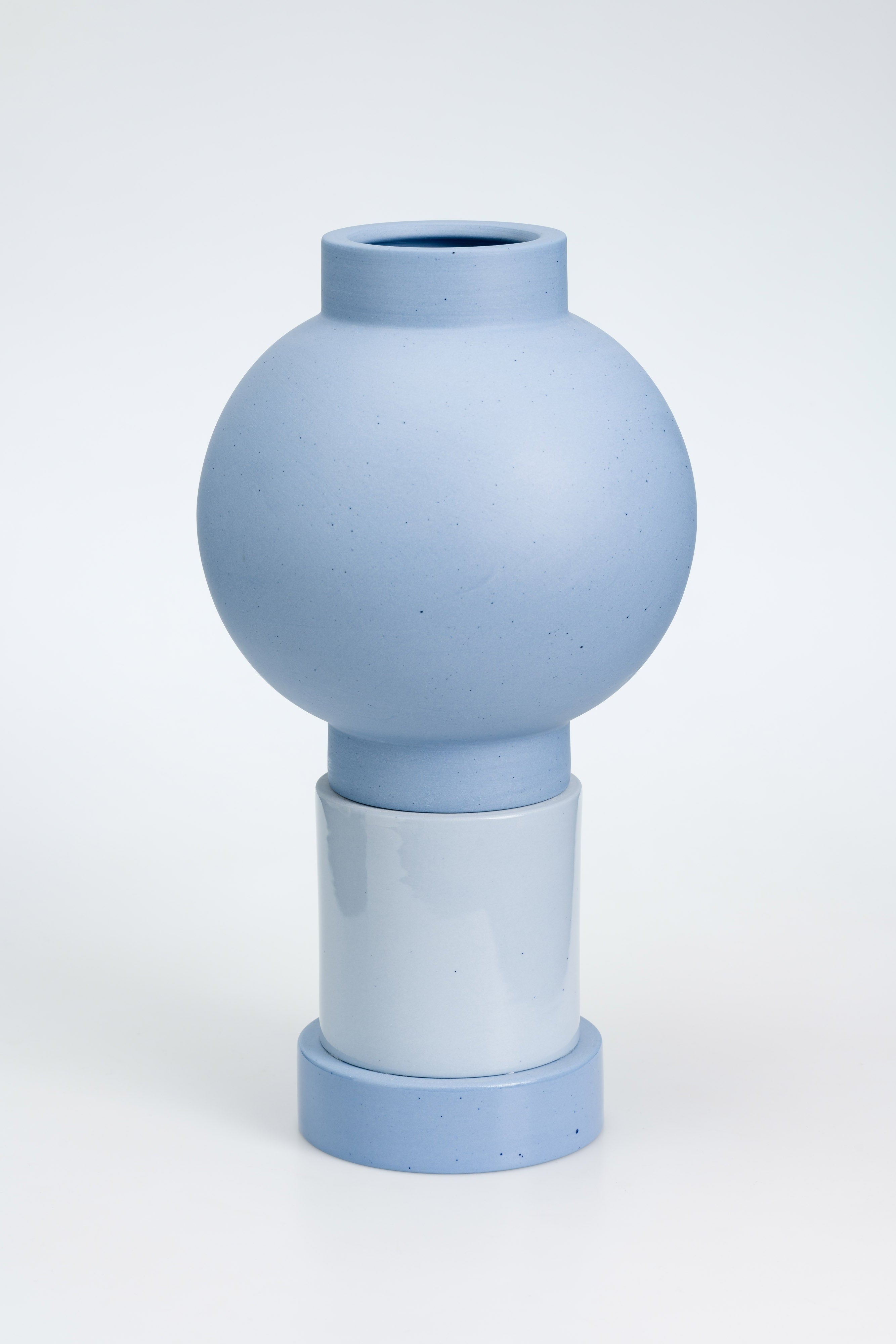 Blue ceramic vase on a white background