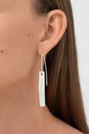 Glazed white porcelain statement earring with custom 925 sterling silver. Handcrafted by IAC member Márton Strohner. Limited series, made to order. STUDIO MASTRO
