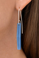 
Glazed blue porcelain statement earring with custom 925 sterling silver. Handcrafted by IAC member Márton Strohner. Limited series, made to order. STUDIO MASTRO

